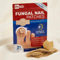 Packaging of fungal nail patches with visible patches on a beige background