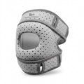 A light gray athletic knee support brace with a perforated mesh design and adjustable straps, shown on a white background.